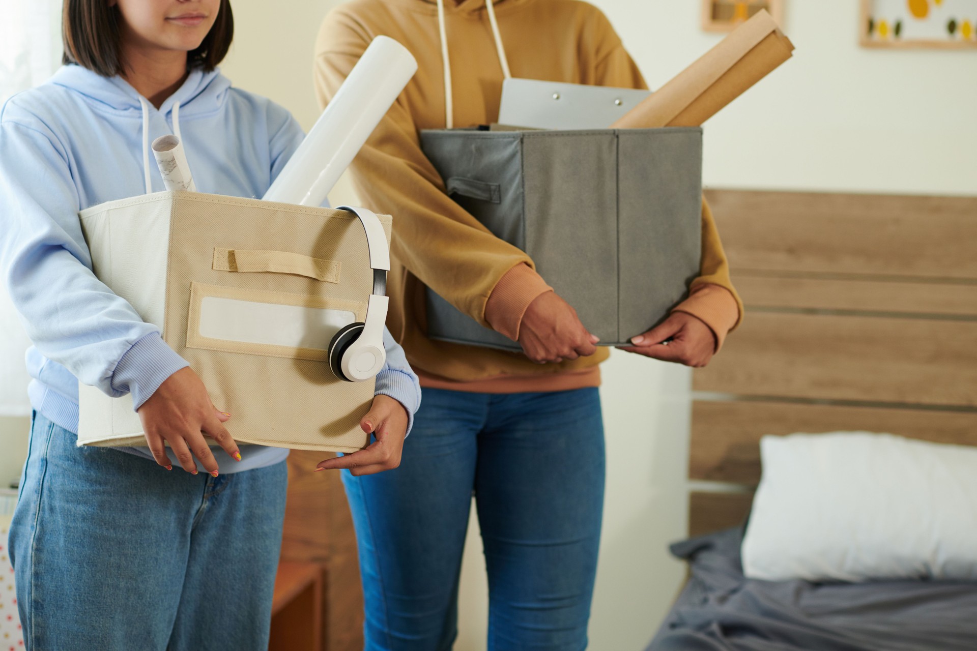 College Students Unpacking in Dormotiry Room